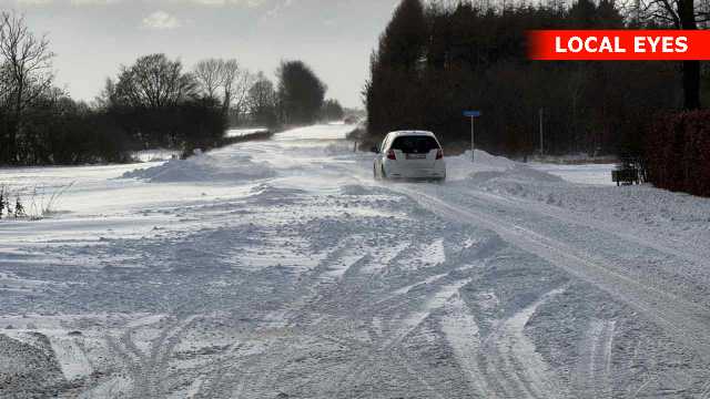 Private hjælper med at rydde vej for sne